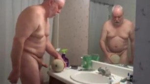 Grandpa bear fucks a cantaloupe melon in the bathroom kinky!
