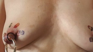 nippleringlover – horny milf sticking fake tattoos on huge pierced nipples close up