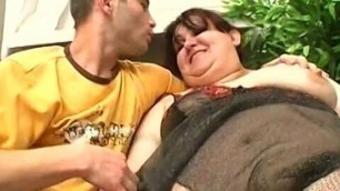 Huge babe on couch gets twat fingered and fucked by stud